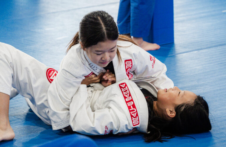 women training bjj and self-defense